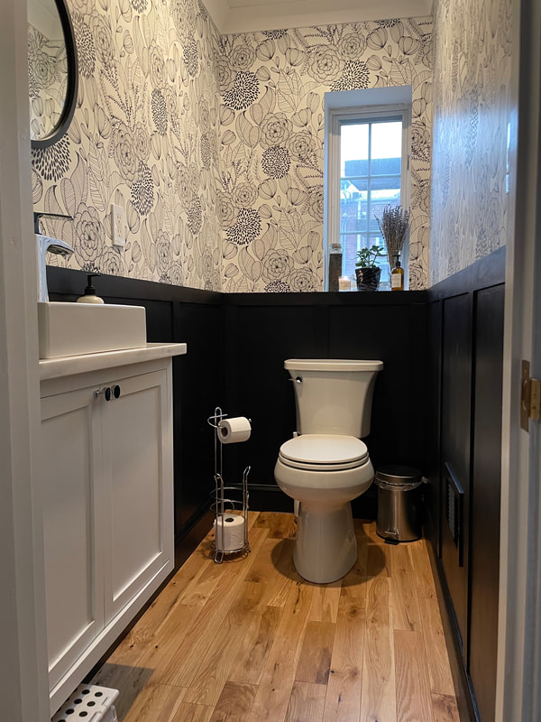 Powder room with floral wallpaper