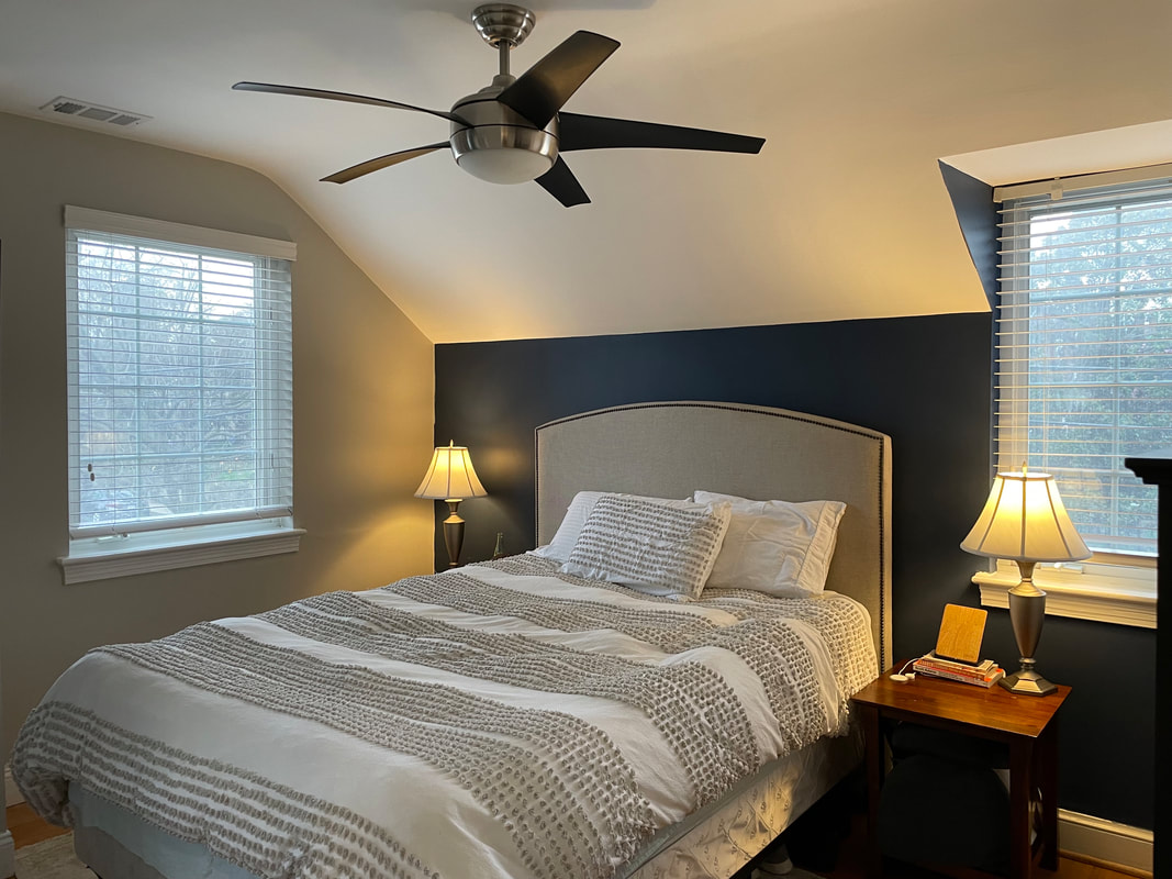 Master bedroom with accent wall
